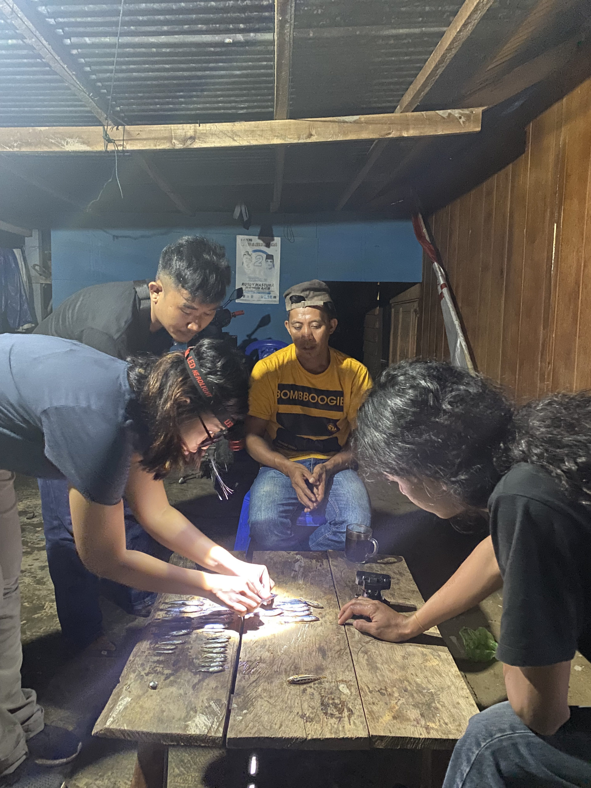 Checking Adrianchthys fish with local fisherman1
