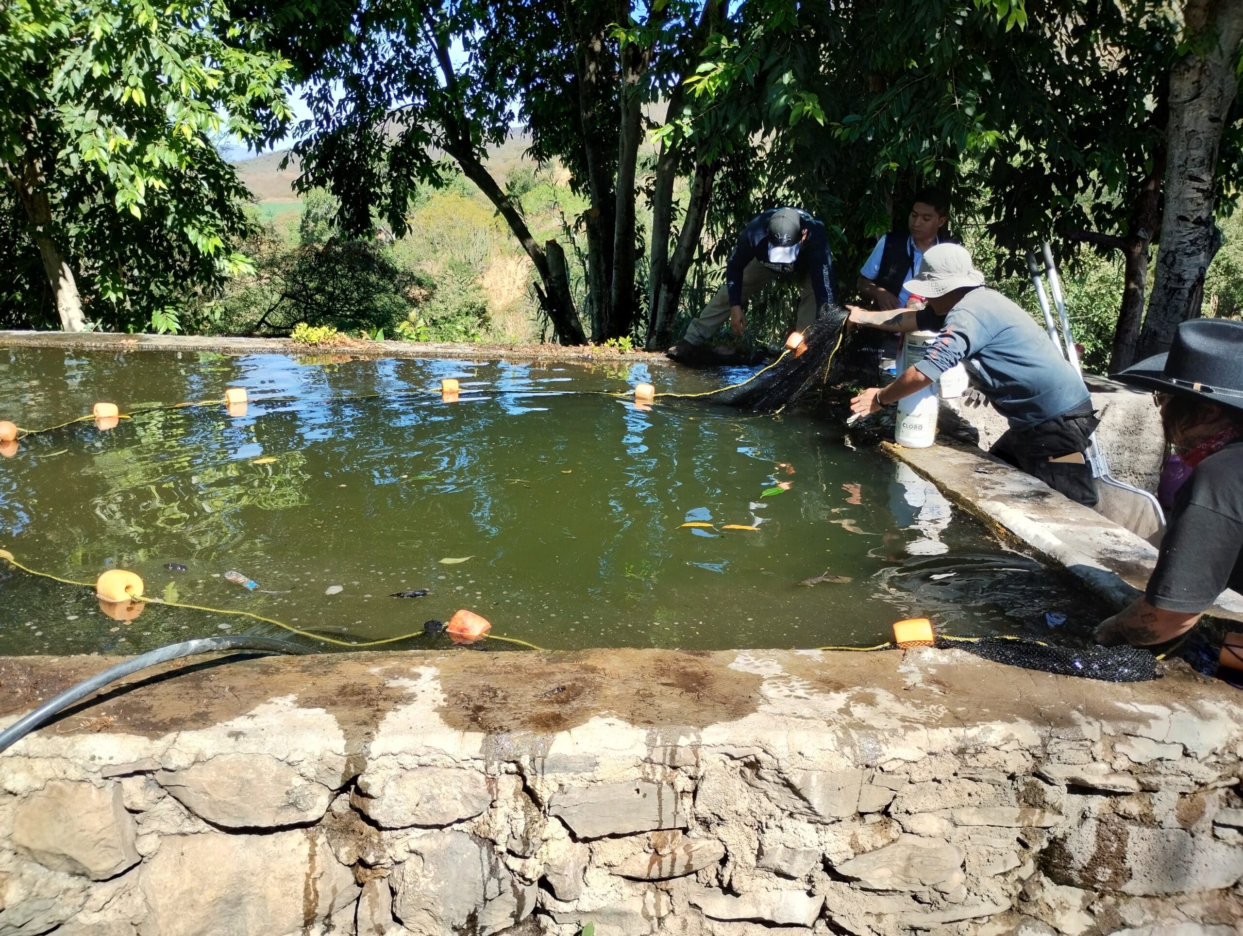 surveying a private cisterne © Mike Köck/Plan G