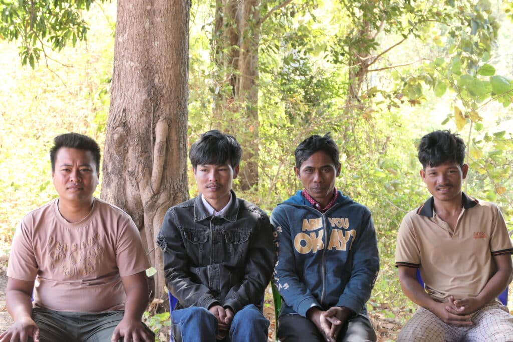Four fishermen in Koh Knhnear, Cambodia, taking part in the pilot study to collect data on threatened fish species © IUCN Asia