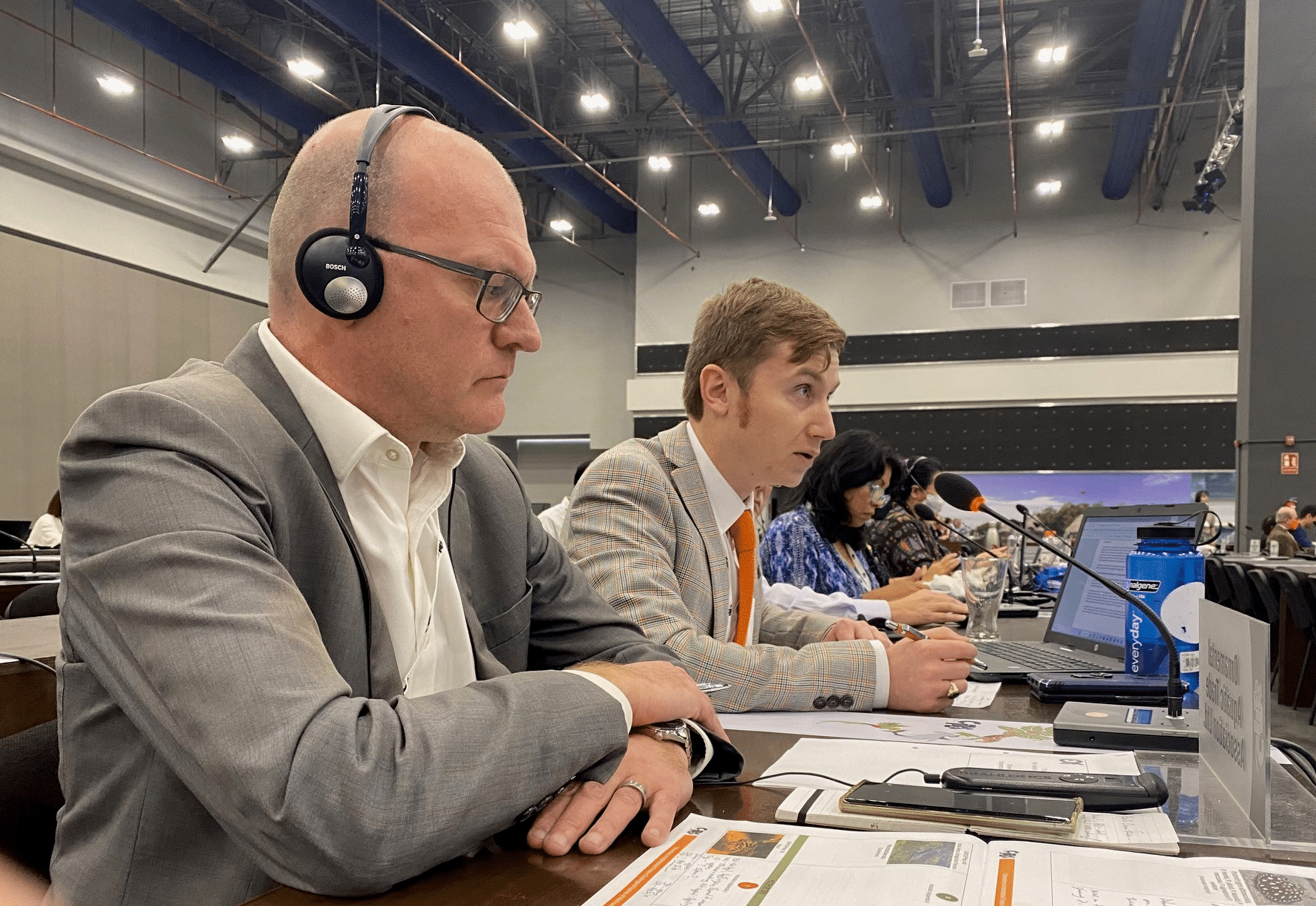 Dominic Whitmee with Dr Matthew Bond speaking at CITES